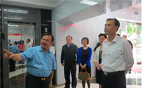 重庆市市委常委、统战部部长刘光磊来mg冰球突破官网入口集团视察调研